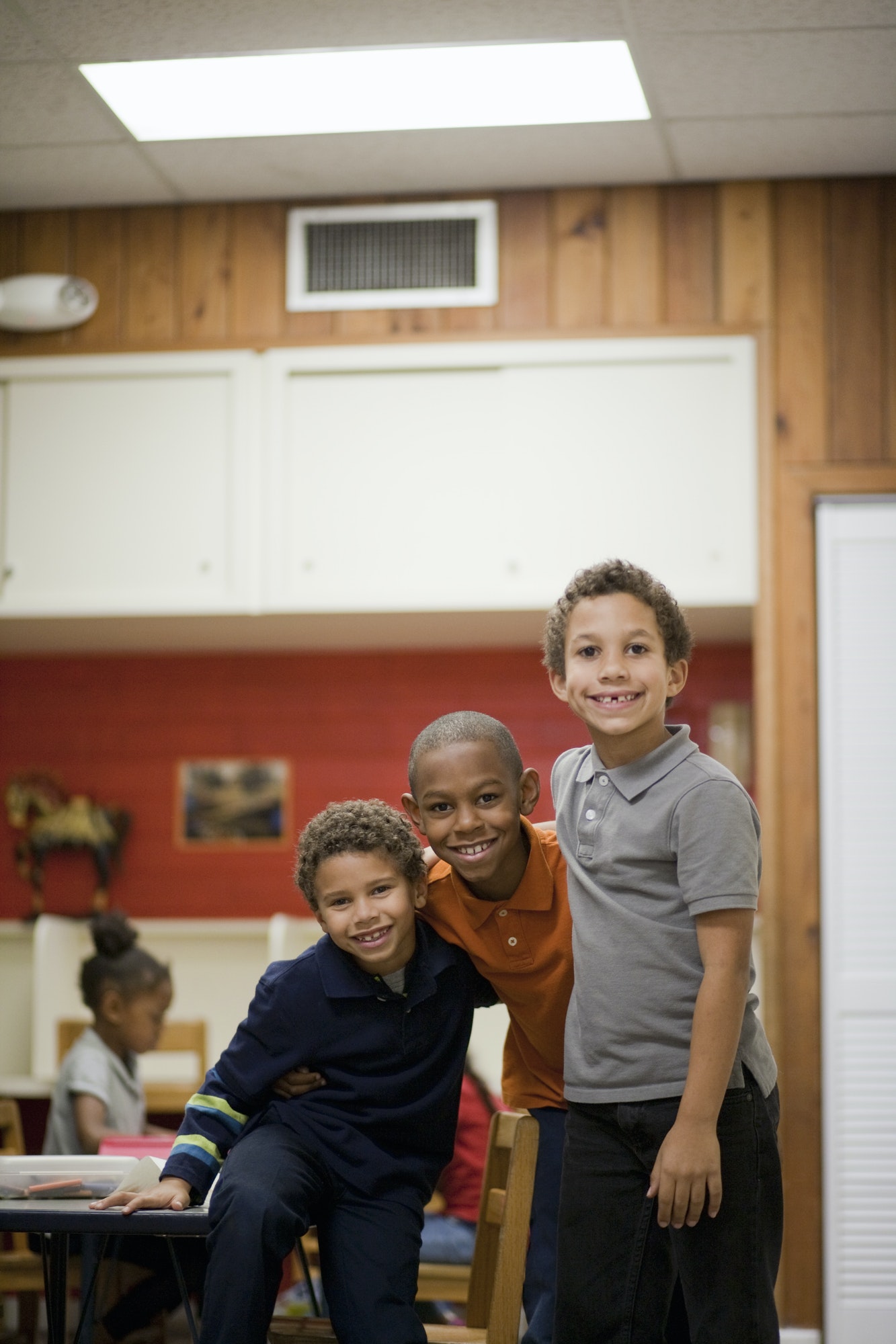 children-smiling-in-classroom.jpg