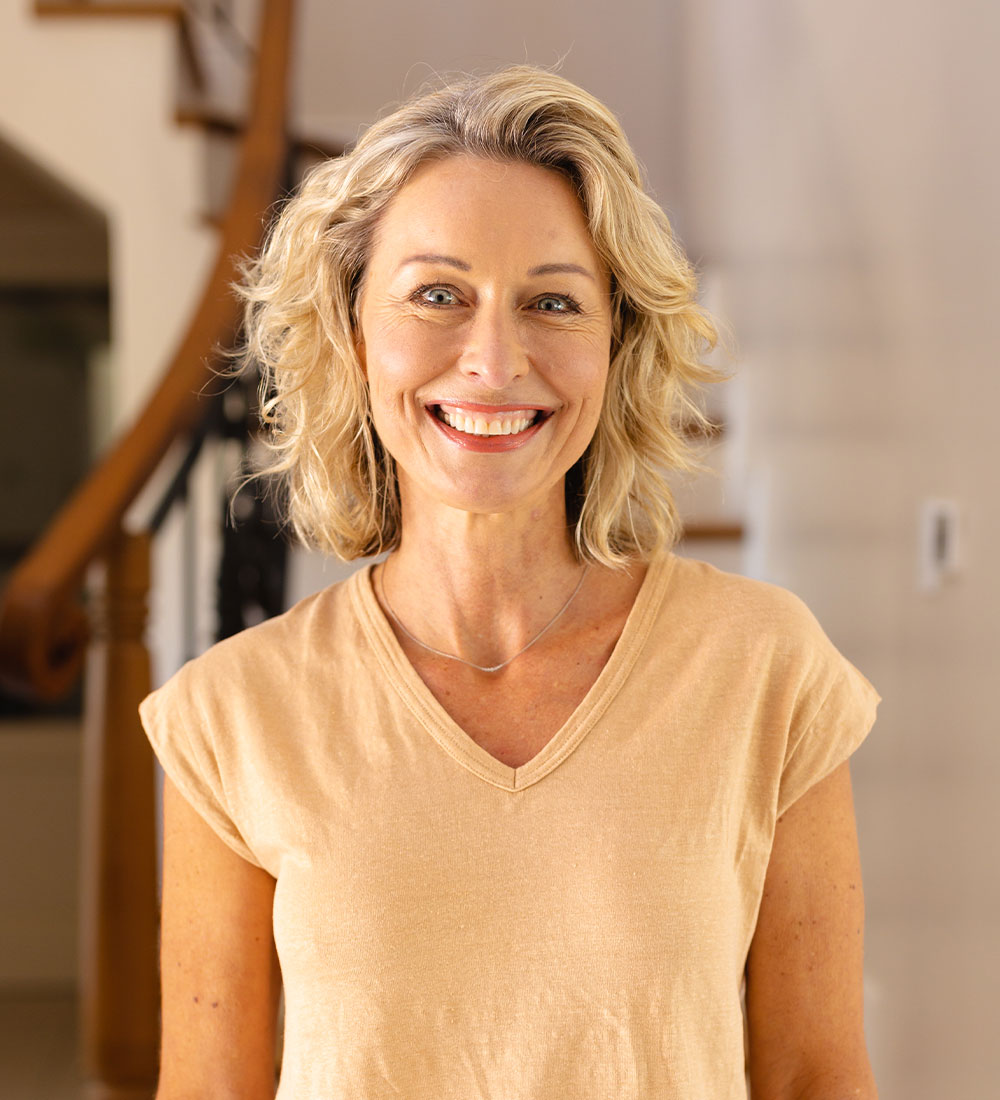 portrait-of-caucasian-senior-woman-smiling-while-s-A6GS48Q.jpg